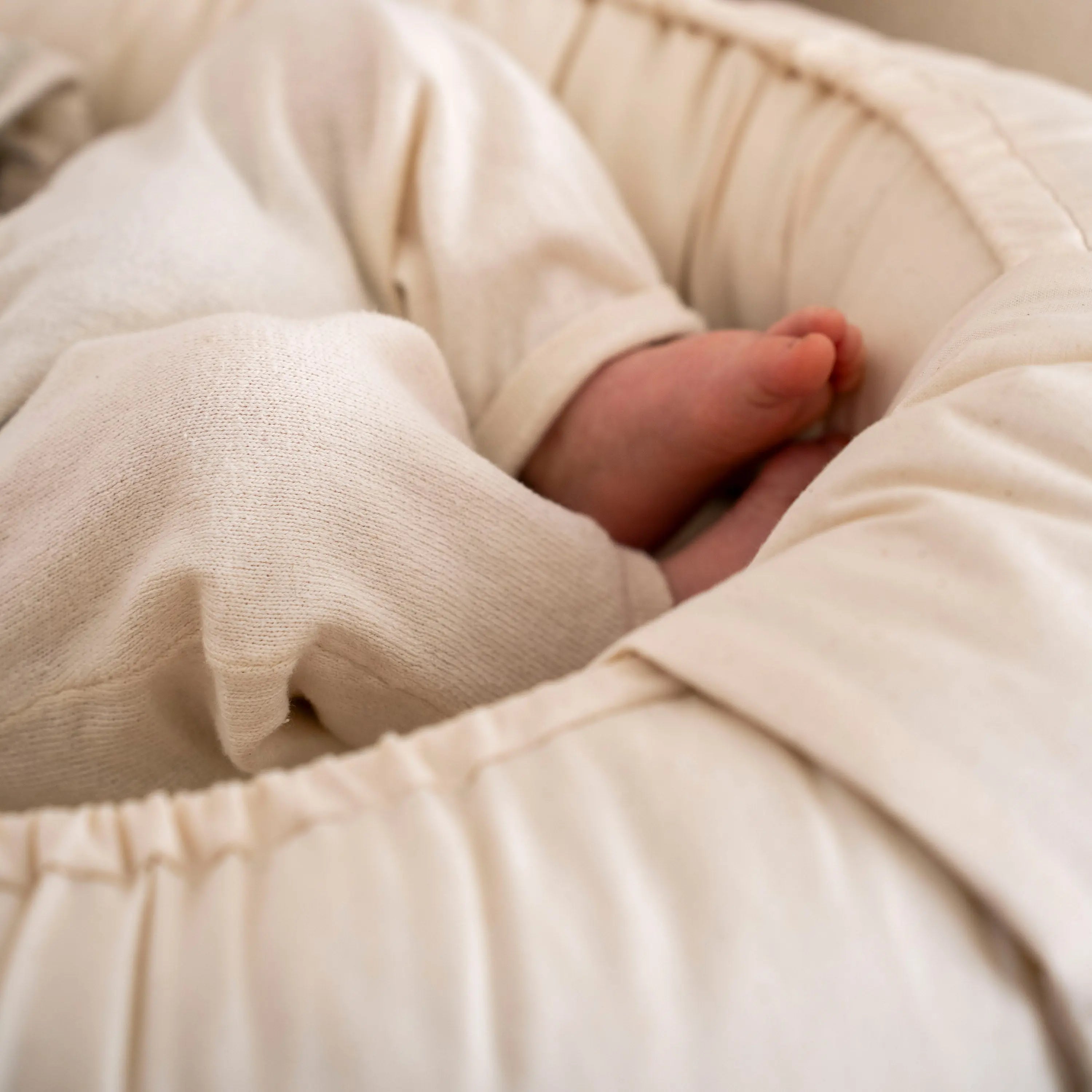 Babynest aus Bio Baumwolle – mitwachsender Baby-Kokon | Creme District for Kids