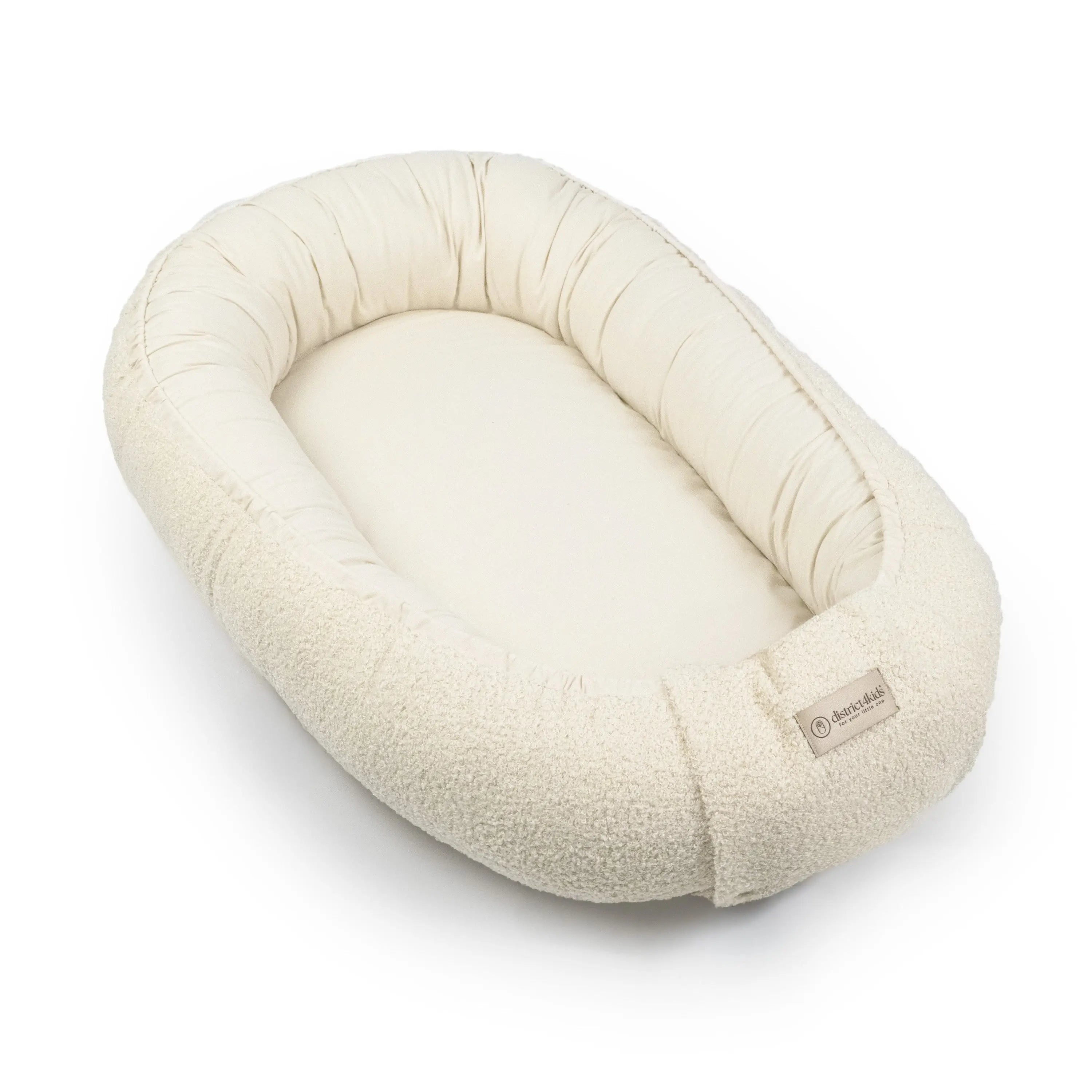 Babynestchen Teddystoff-Bouclé – mitwachsender Baby-Kokon District for Kids