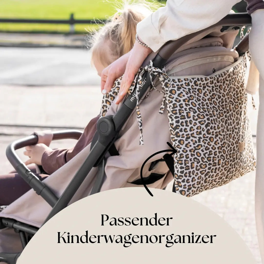 Sitzauflage Baumwolle Leoprint für den Kinderwagen inkl. Gurtschutz - universell passend District for Kids