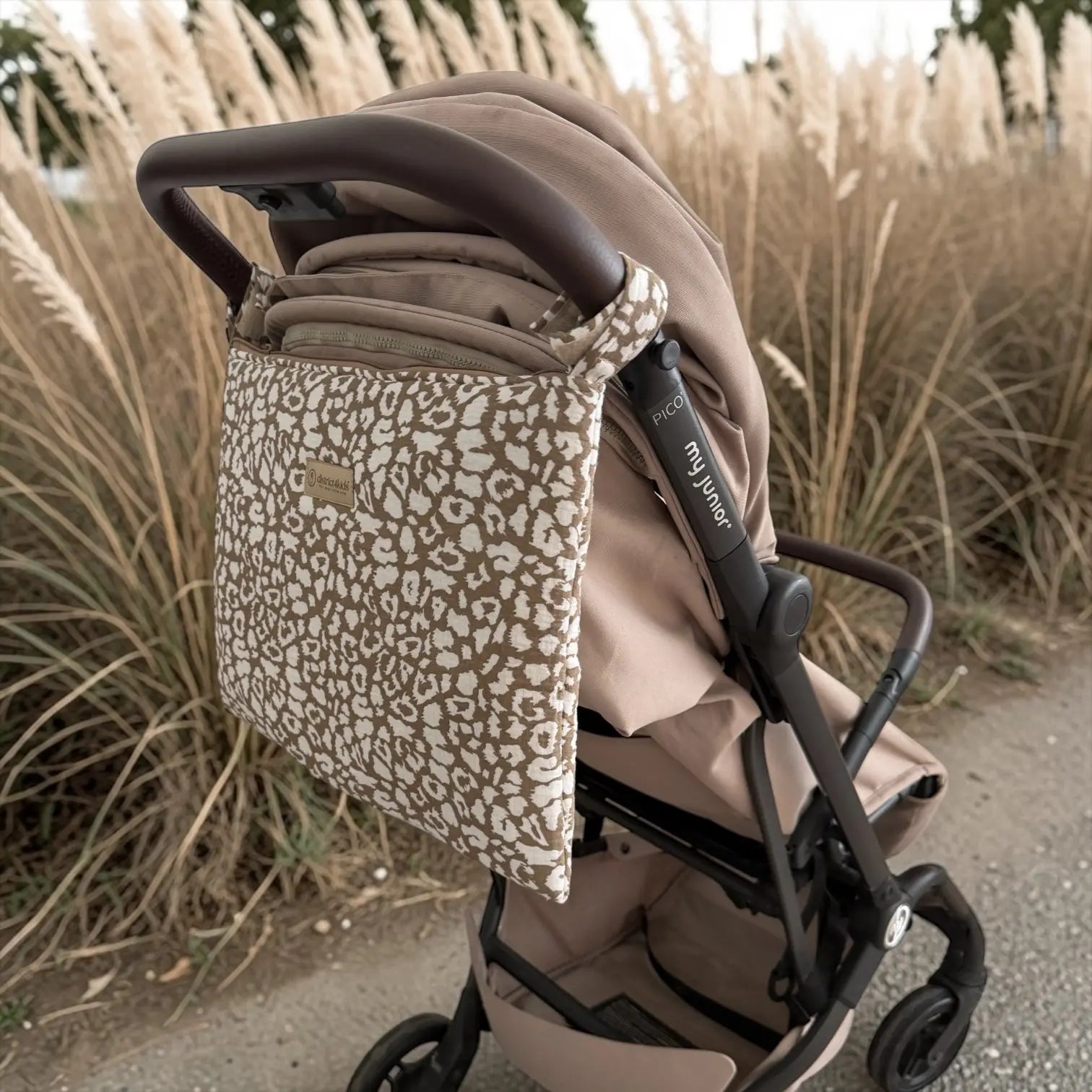 Kinderwagentasche Organizer Musselin Leoprint - Stil & Ordnung für Kinderwägen District for Kids