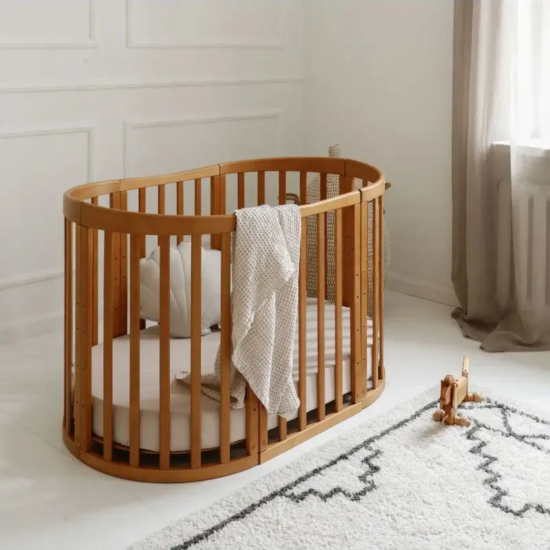 Babybett 7-in-1 – Ein Bett für viele Jahre - mitwachsend | Ovale Form - Babybett