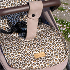 Sitzauflage Baumwolle Leoprint für den Kinderwagen inkl. Gurtschutz - universell passend District for Kids